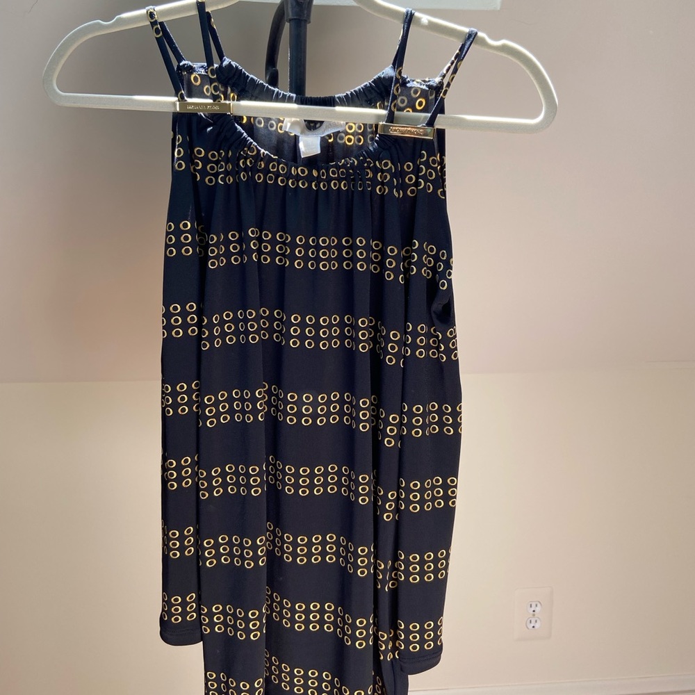 Classy Michael Kors top in rich black w/ gold-circled pattern throughout.